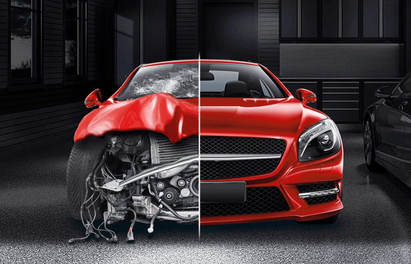 Picture of a red car in collision repair, half destroyed. 