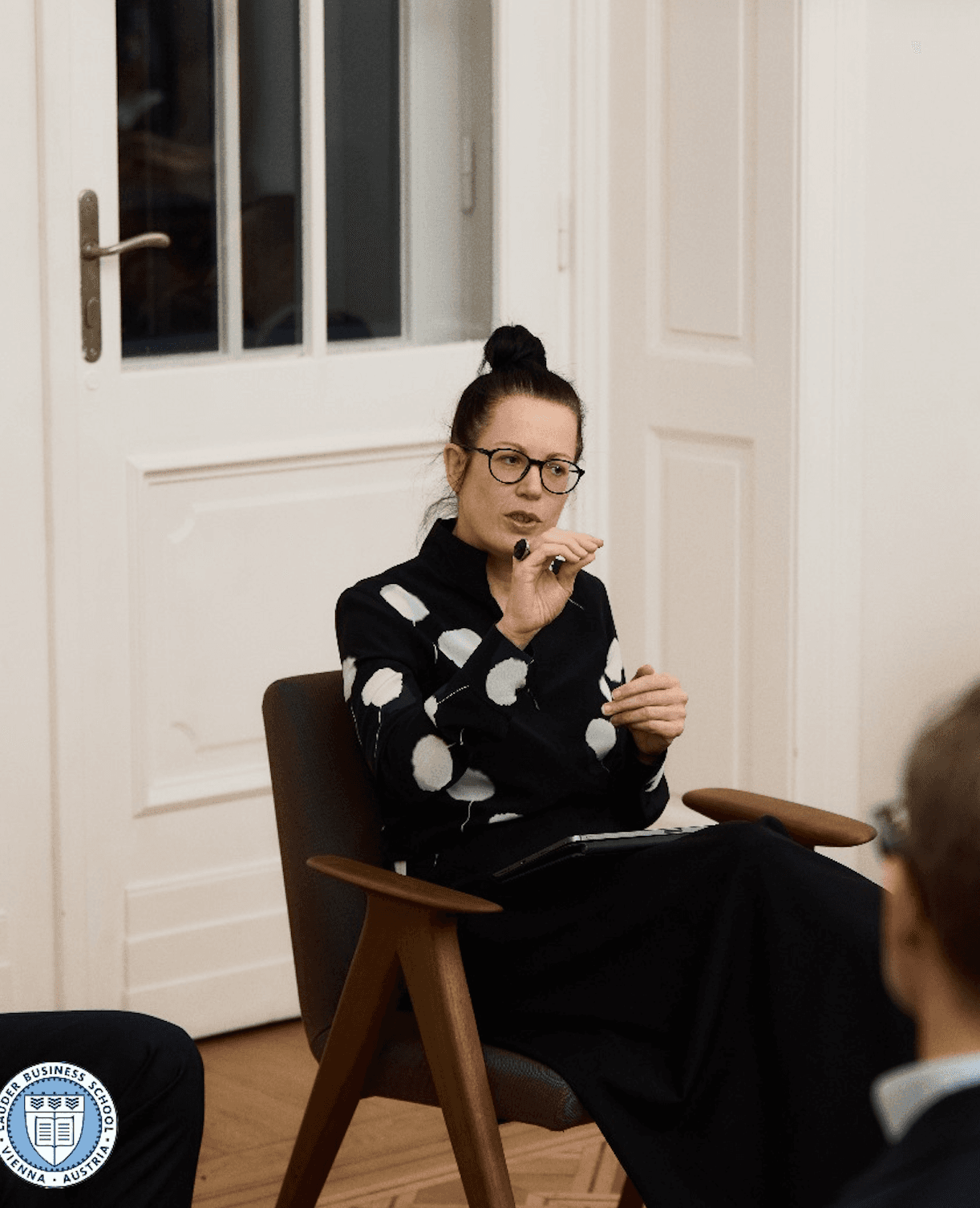 Speaker presenting to an audience during a career talk at LBS