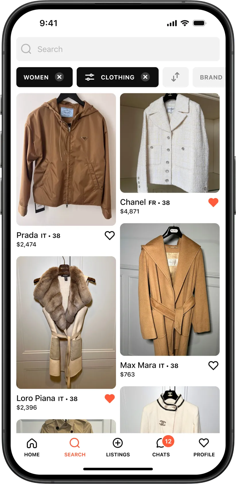 Search results screen of the Tuff Stuff marketplace app, showing filtered luxury clothing items with active category filters, product cards, prices, and wishlist actions.