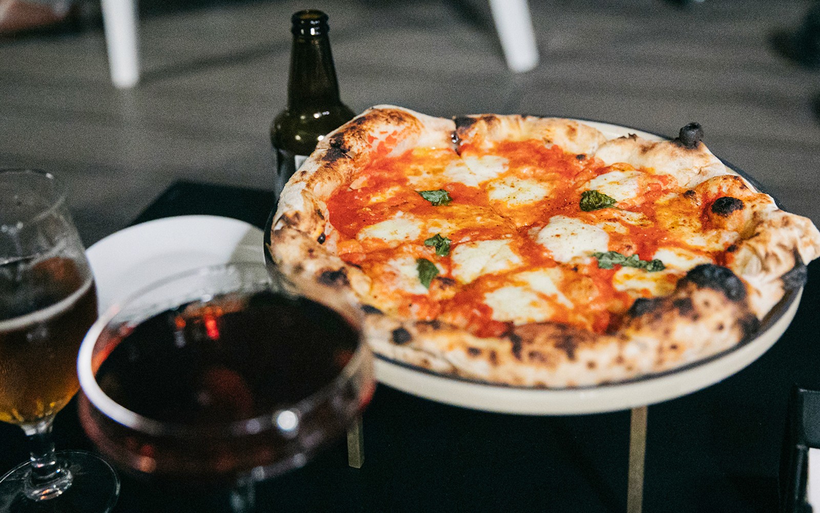 Pizza with drinks on Trastevere Food Tour in Rome.