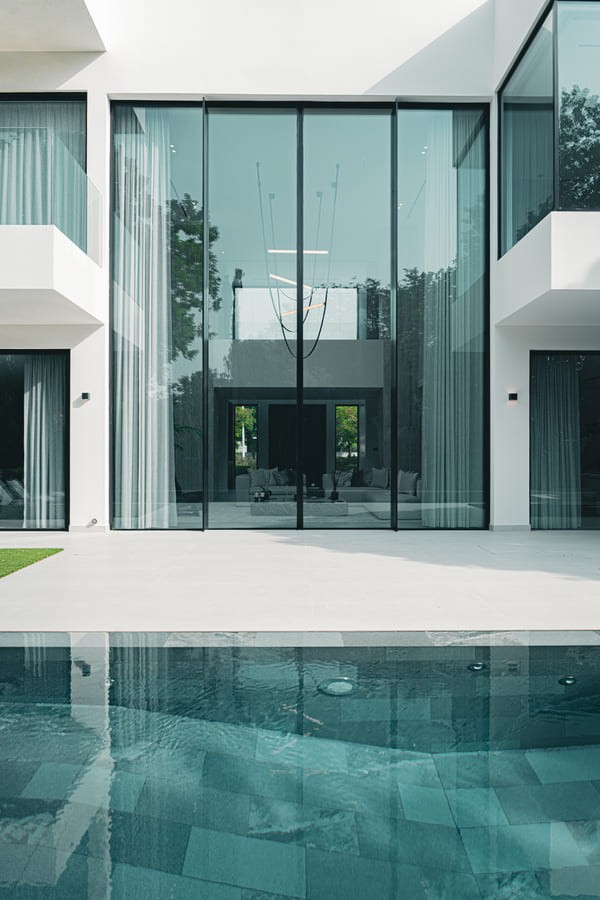 Image of a large villa with a pool 