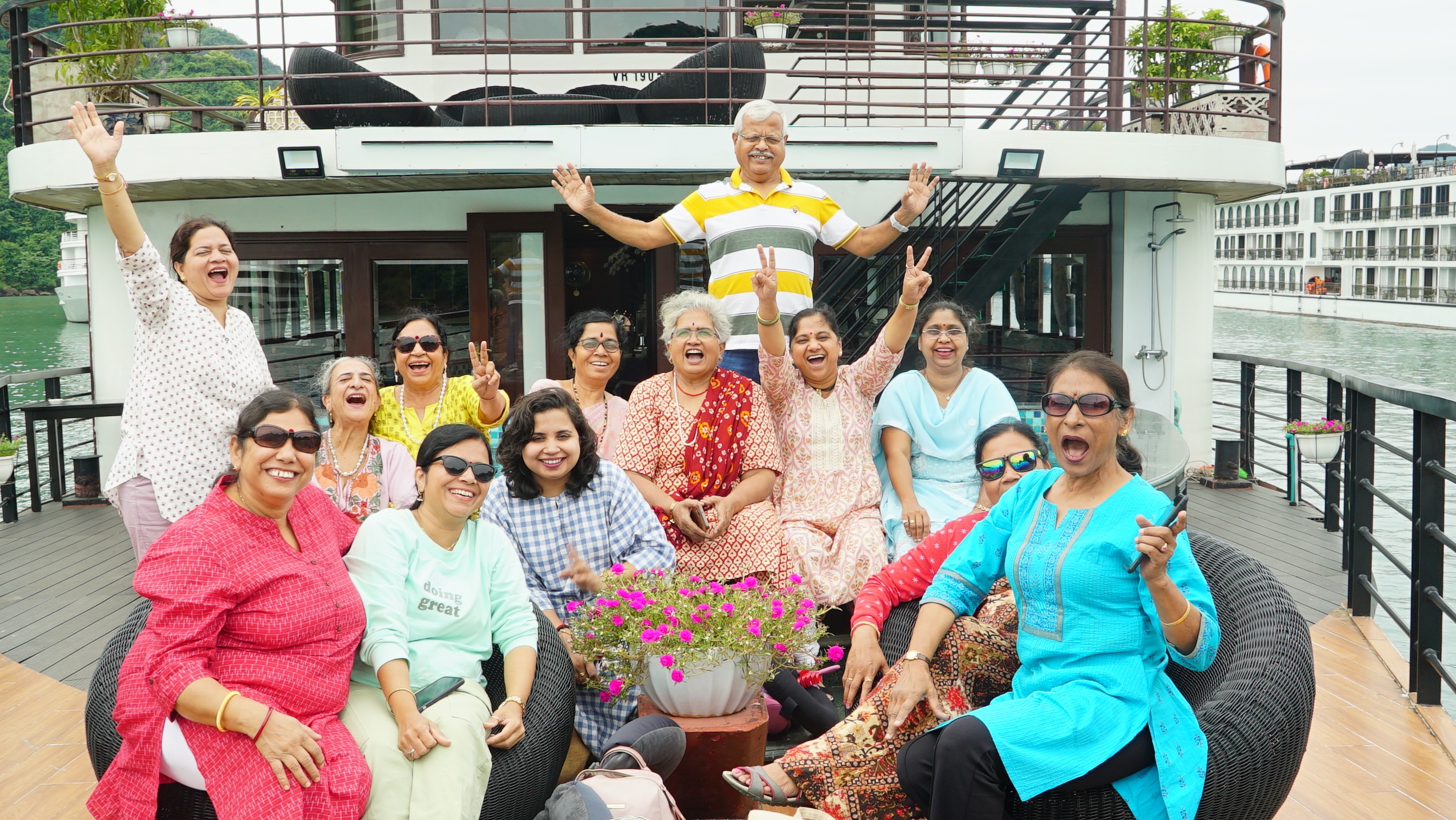 group of people setting up campfire