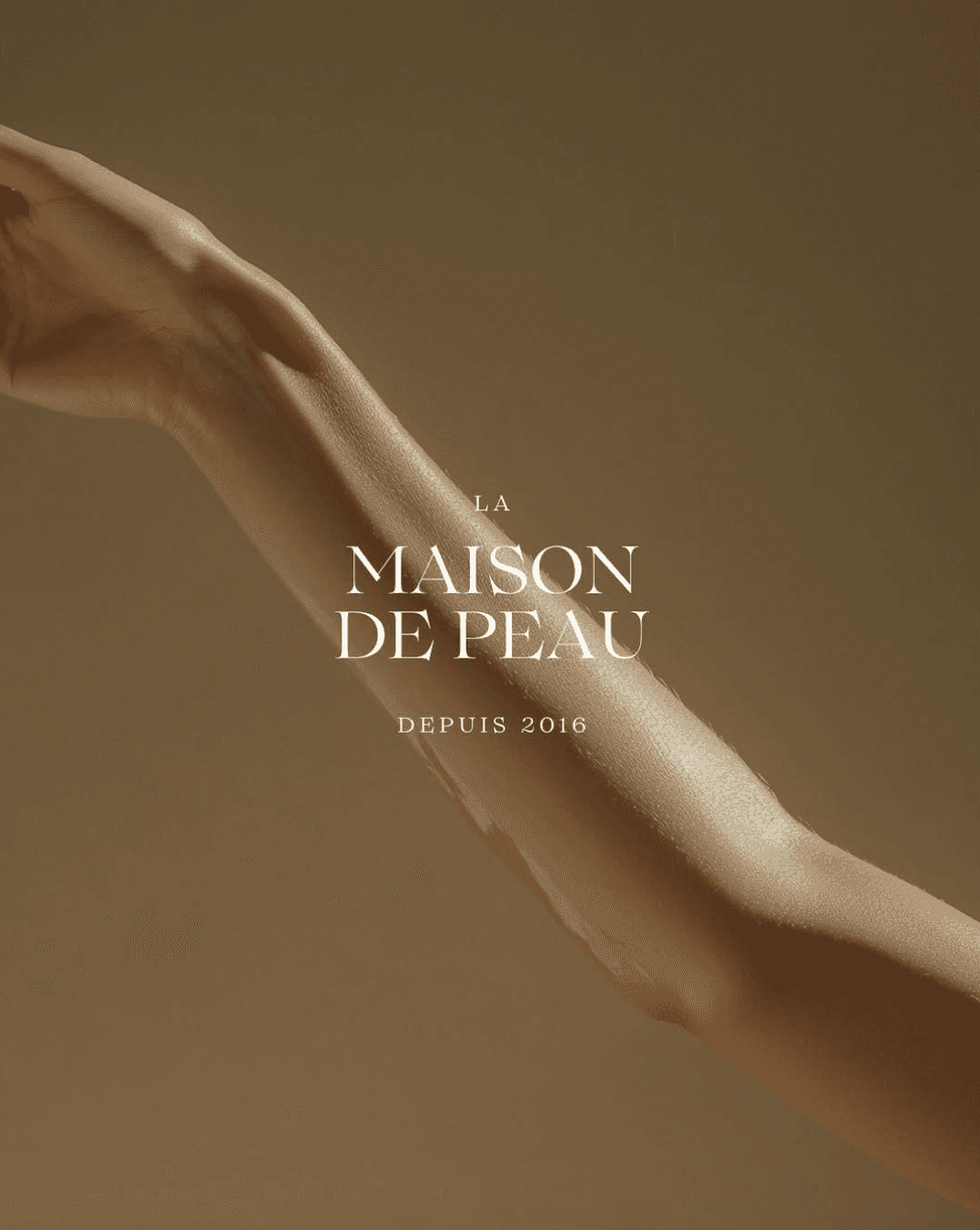 Warm orange living room with sofa and lamp.