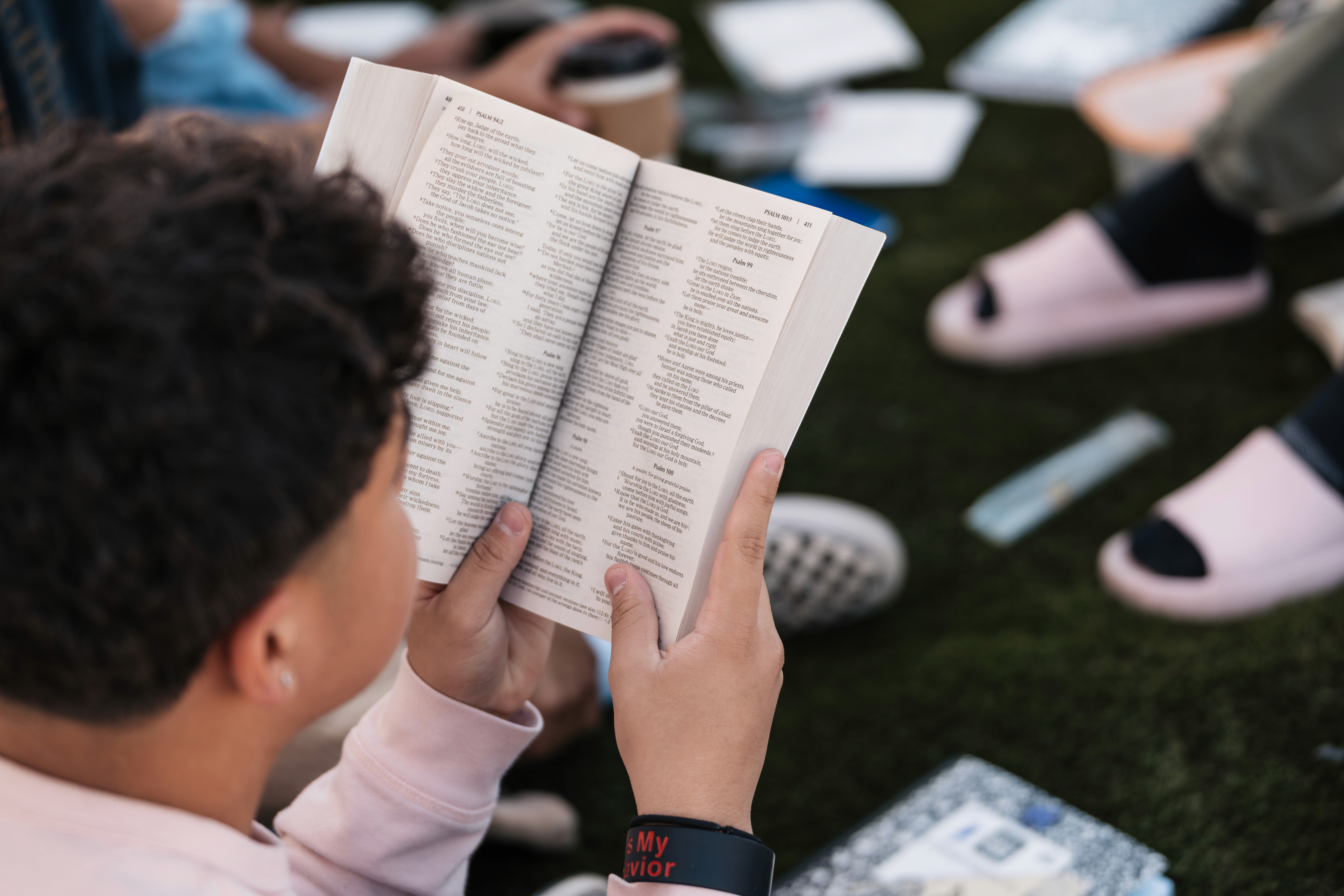 Young man reading bible