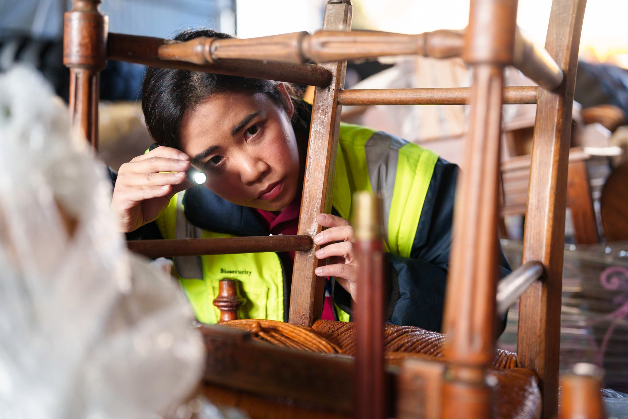 A woman inspects cargo