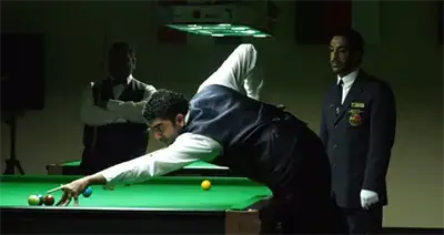 a snooker player at the table