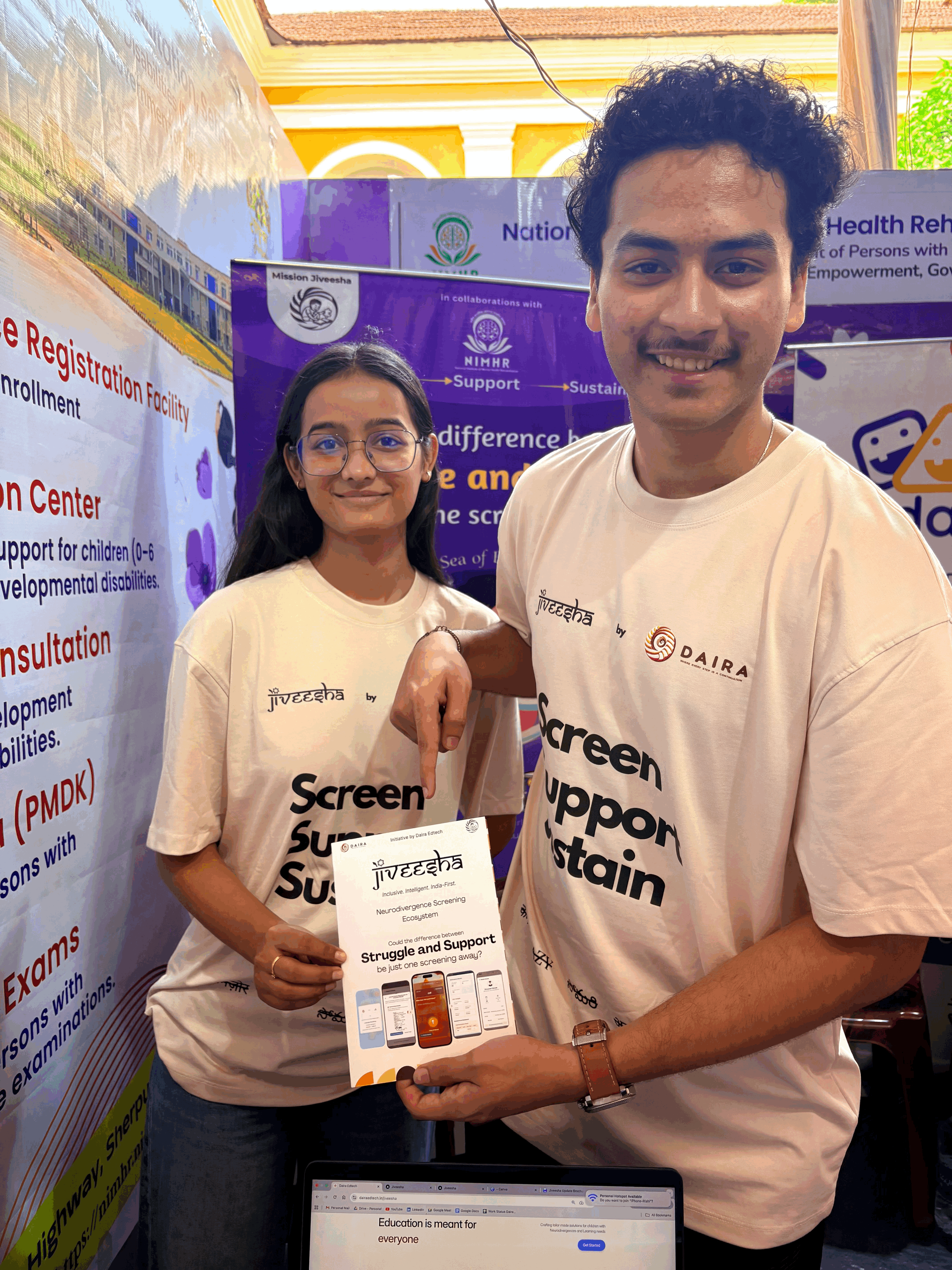 a group of children sitting on steps in front of a building