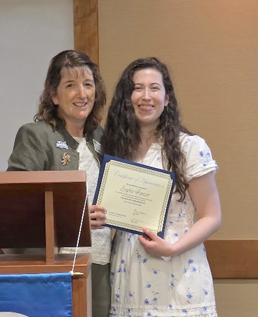 Mindy Holland, left, with Samuel Booth Leadership Award recipient Sophie Panzer.