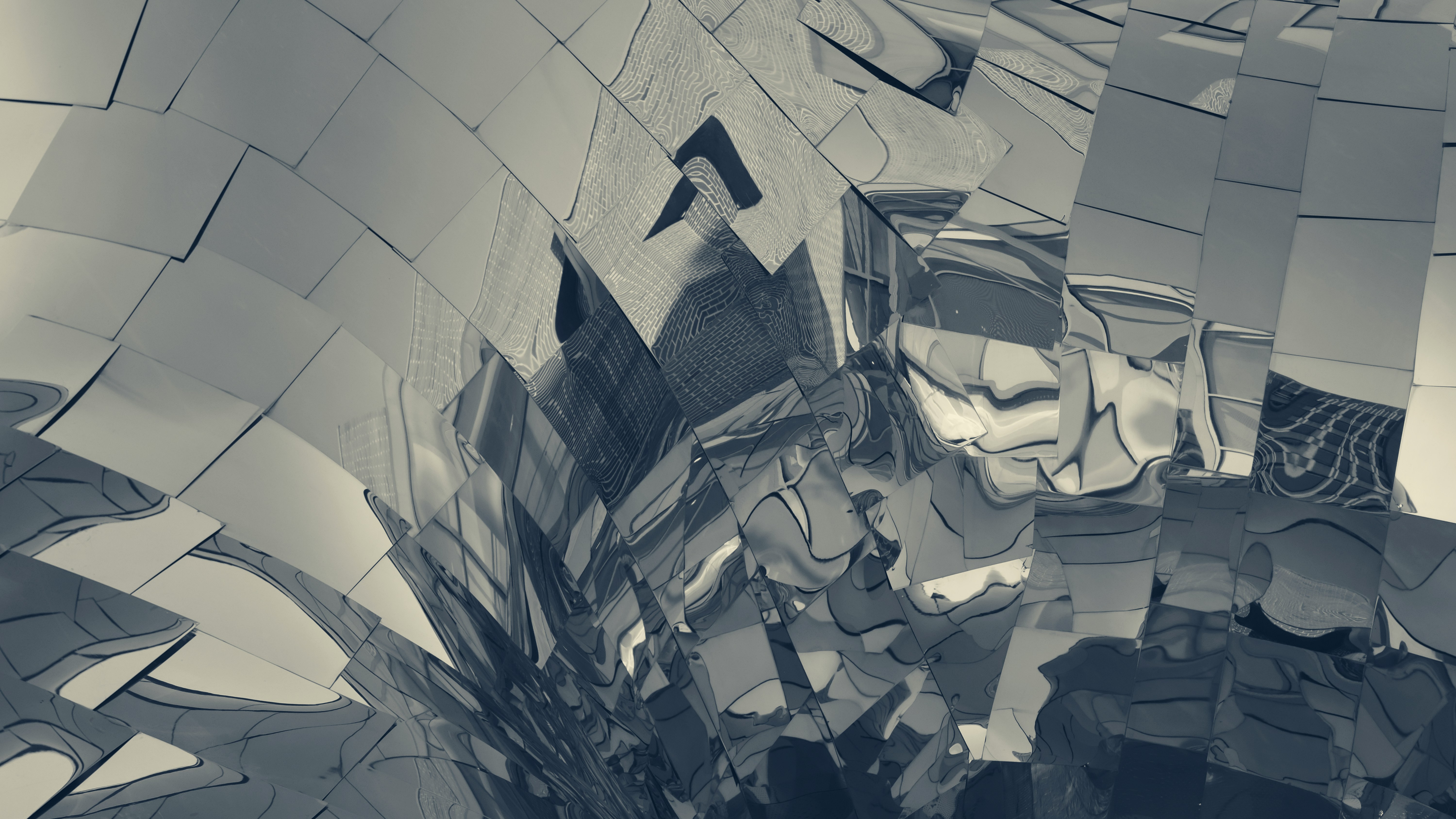 a black office chair sitting in the dark