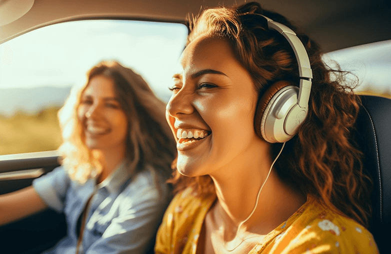 woman listening to songs - Music-player-apps-for-vacation