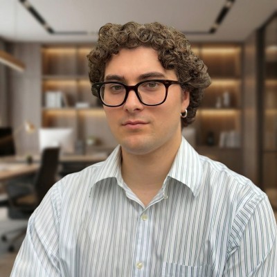 man in white crew neck shirt wearing black framed eyeglasses