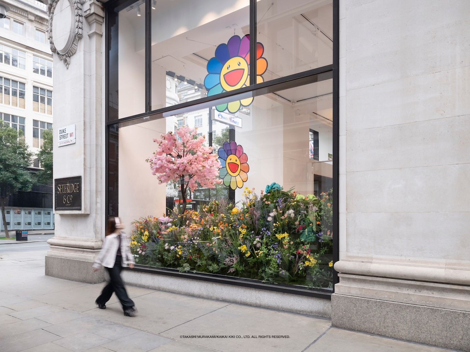 Financial trading chart displaying red and green candlestick patterns on a dark background