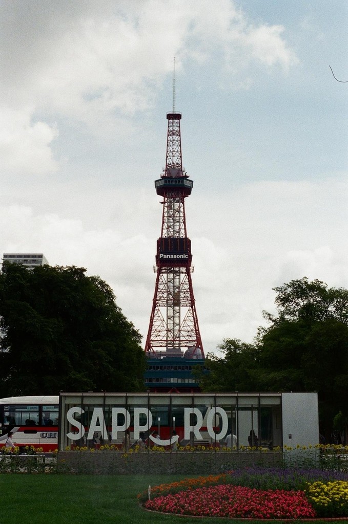 a cell phone leaning on a ledge