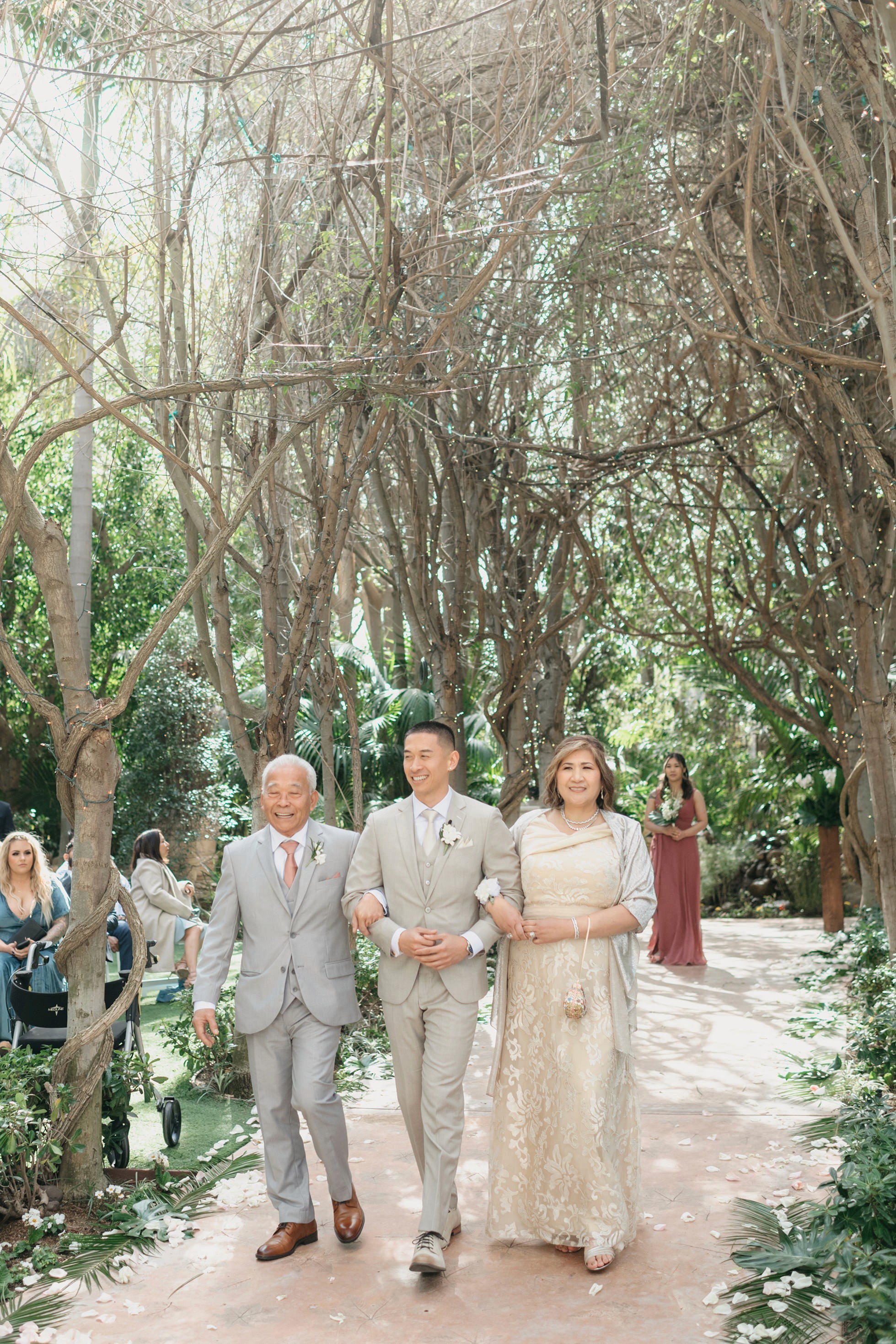 Flat lay wedding details with bouquet, rings, and sparkling bridal heels