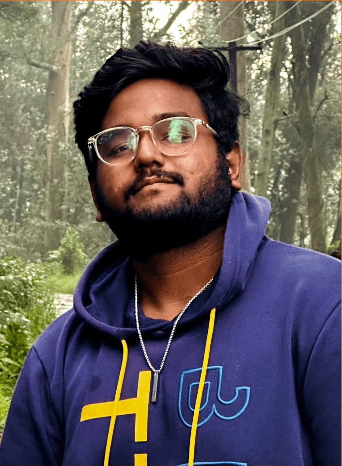 A young man riding a bicycle