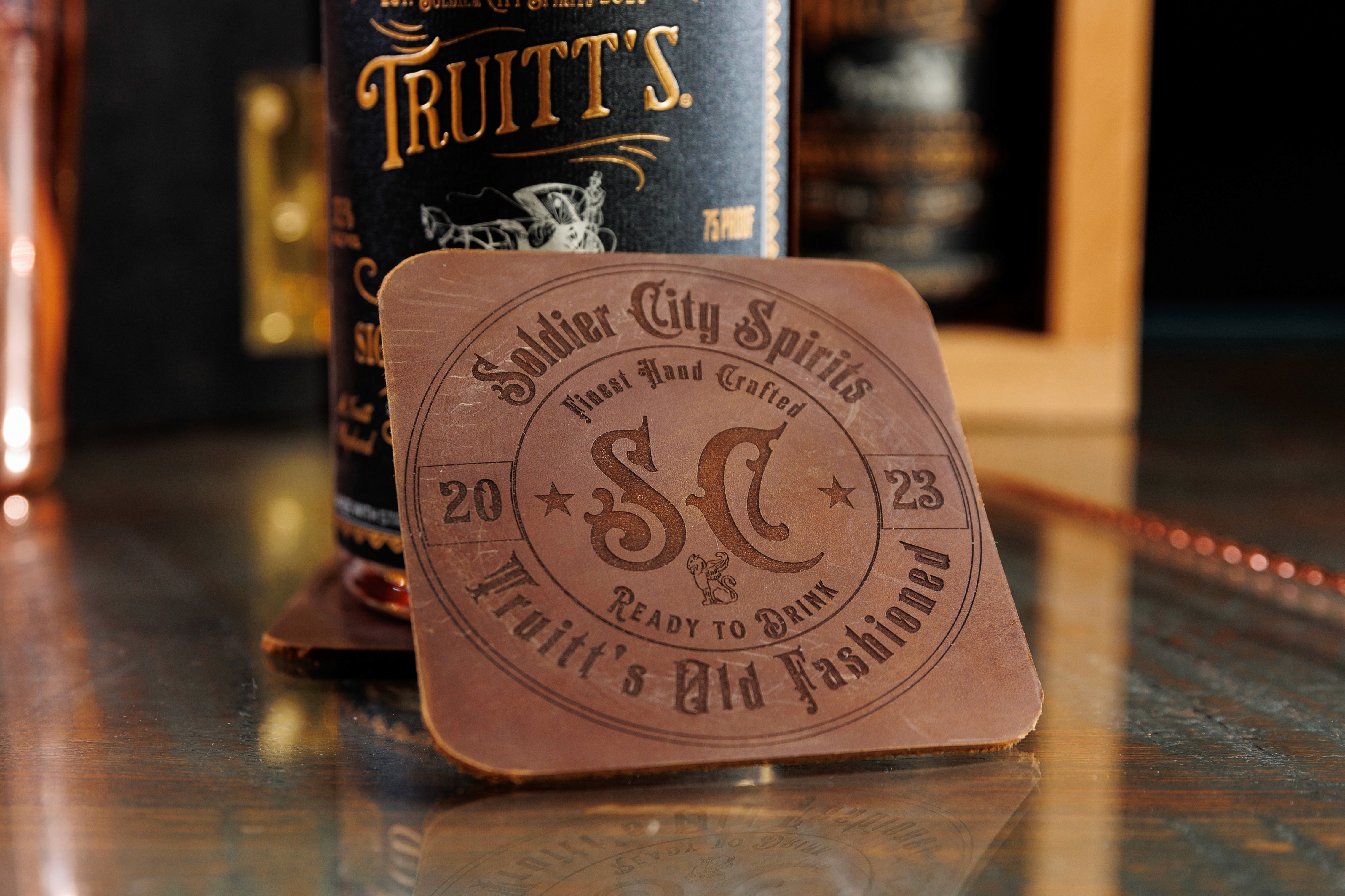 Leather coaster with logo