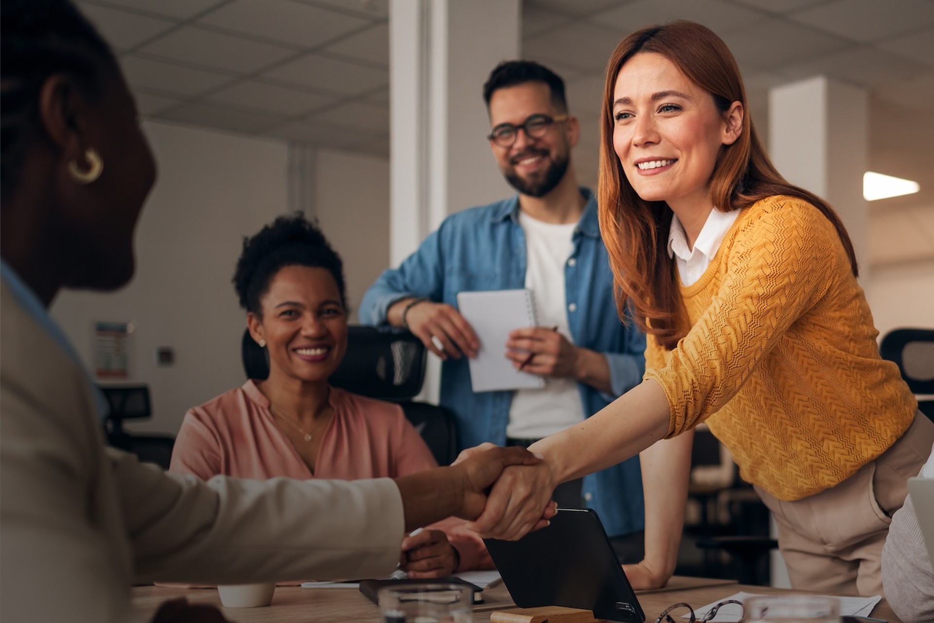 A photograph of an executive using CloudControl by signageOS to monitor and control digital signage devices