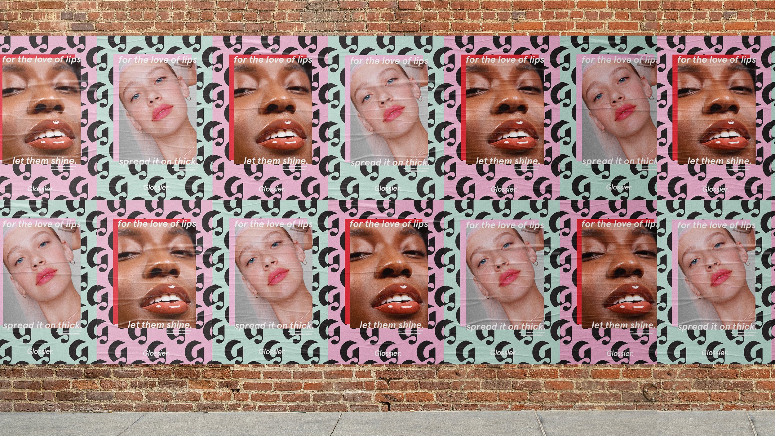 Glossier For the Love of Lips campaign on a brick wall