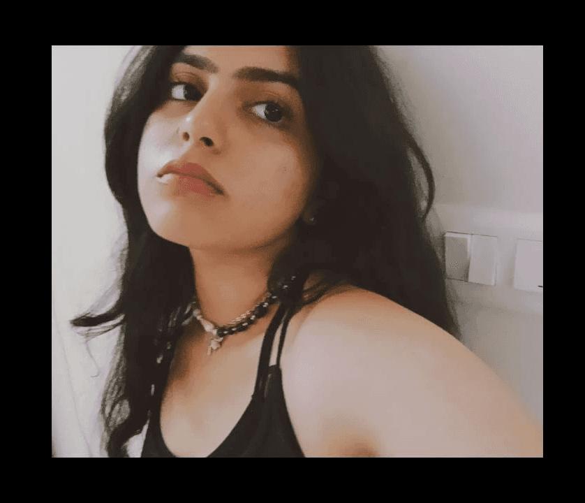 A young girl smiling