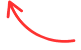 Red hand-drawn curved arrow pointing up and left on a transparent background.