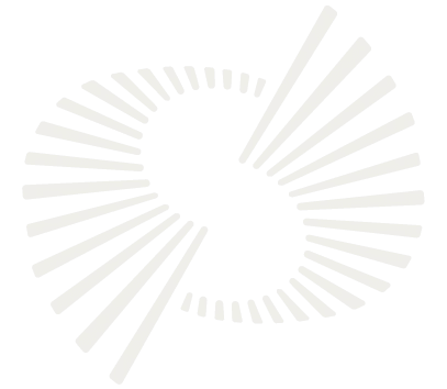 Creative workspace with large windows and a wall full of inspiration boards.