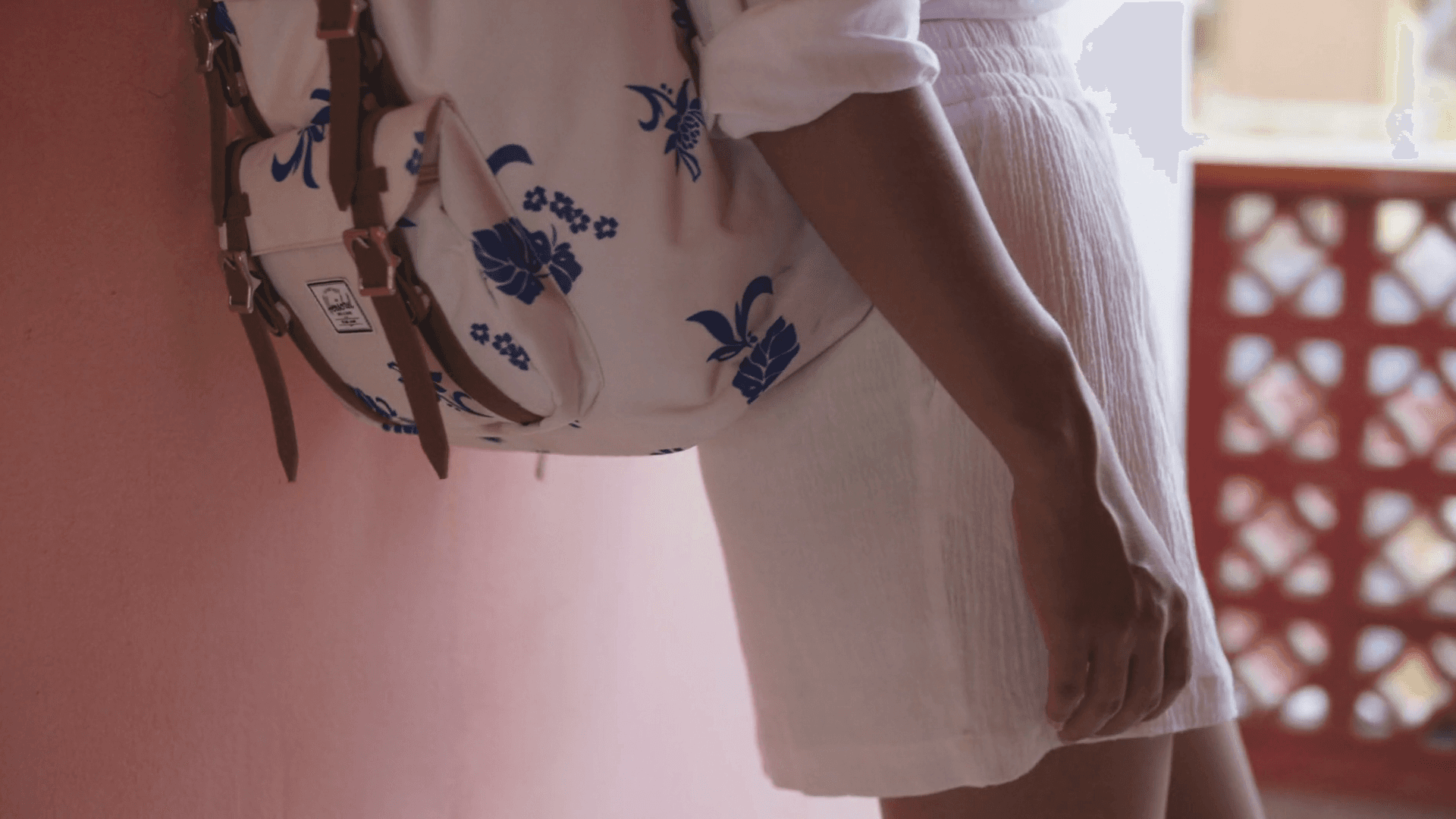 Busy city street at night with glowing billboards