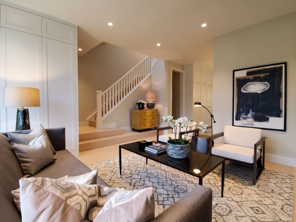 Image of Luxury living room interior design by KHD Homes featuring furniture and layout design by expert home builders.