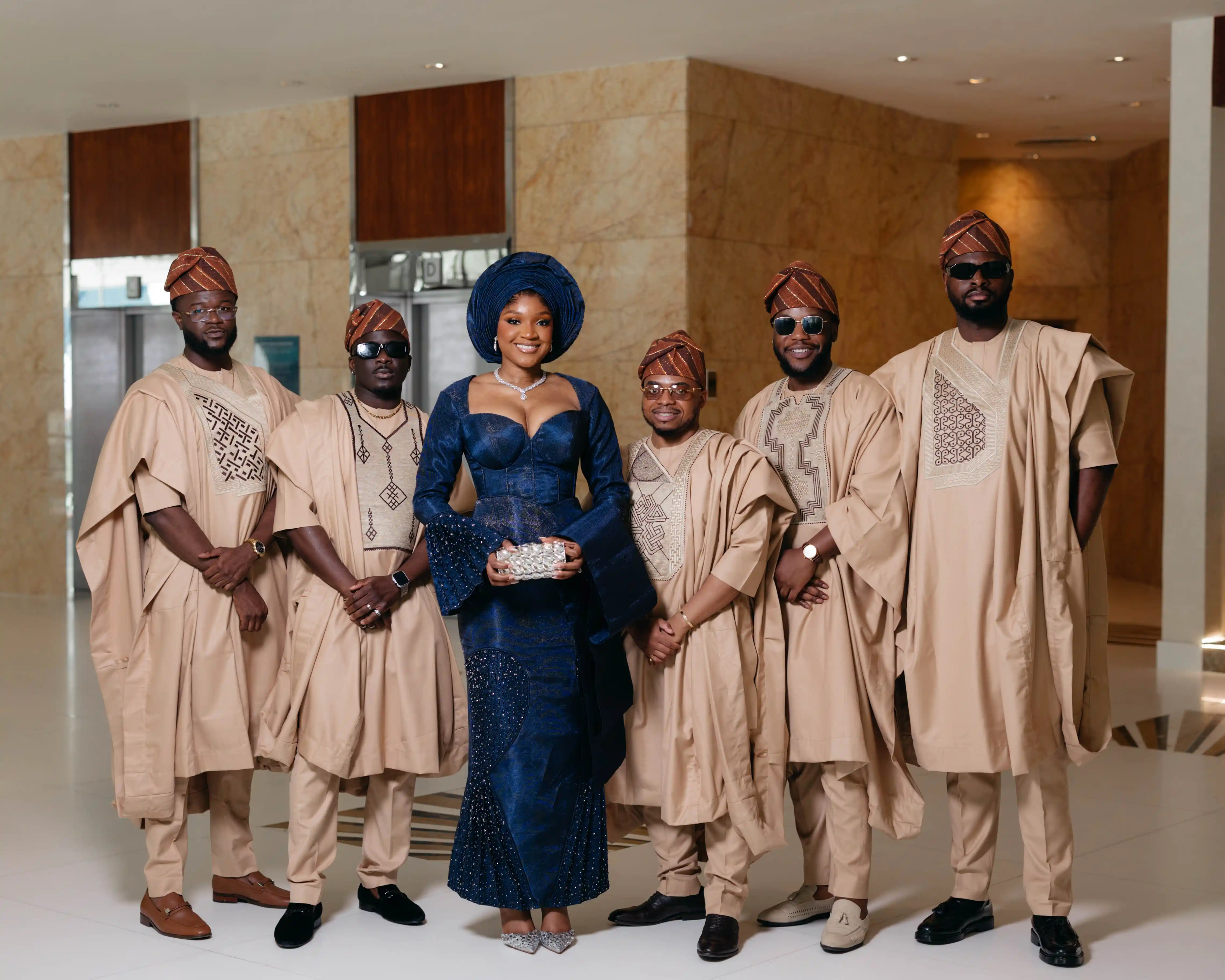 Newlyweds celebrating their wedding ceremony with family and friends.