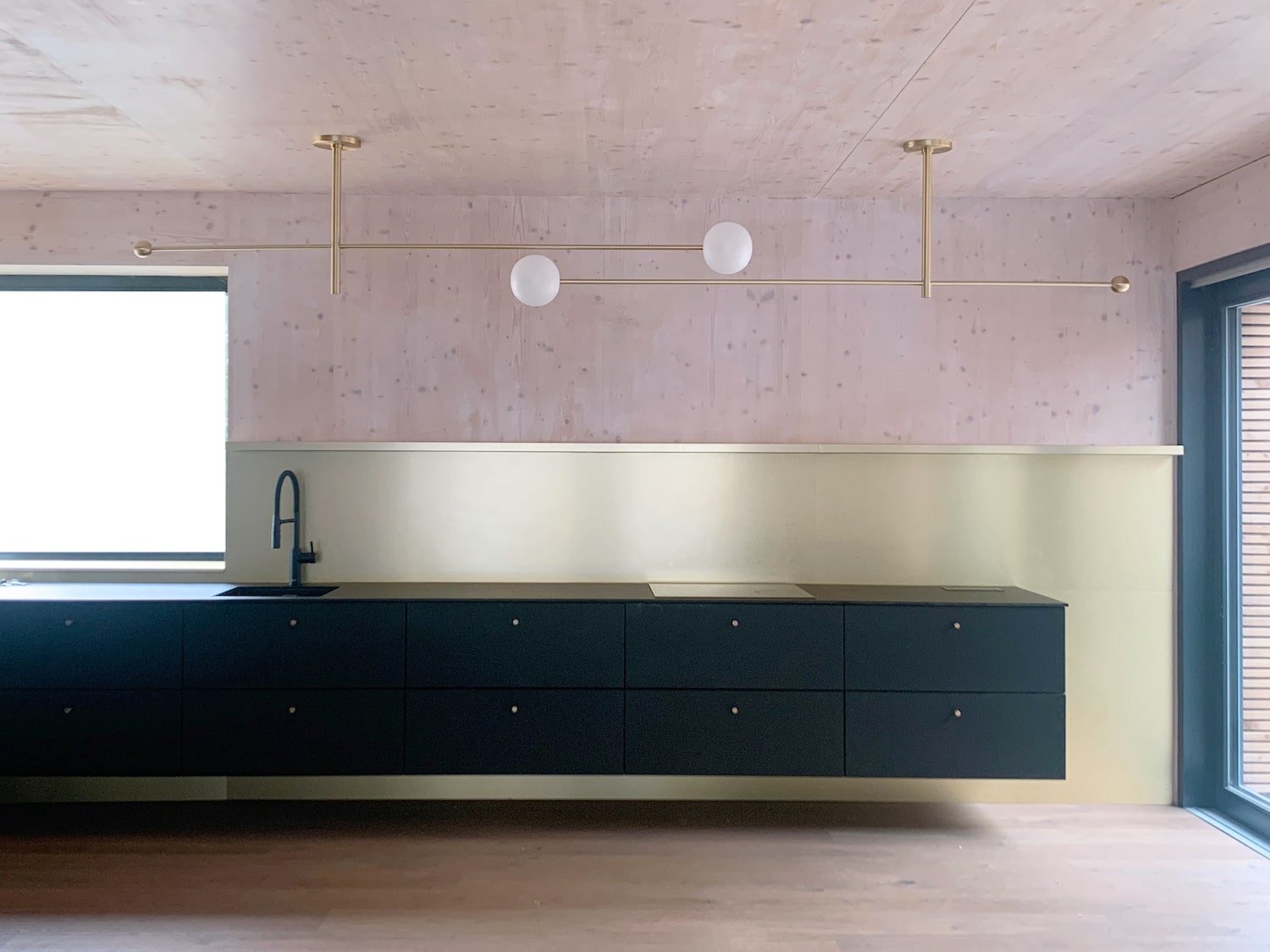 Ceiling mounted Luna Orbit light defining spatial atmosphere through adjustable orientation by Jiri Krejcirik