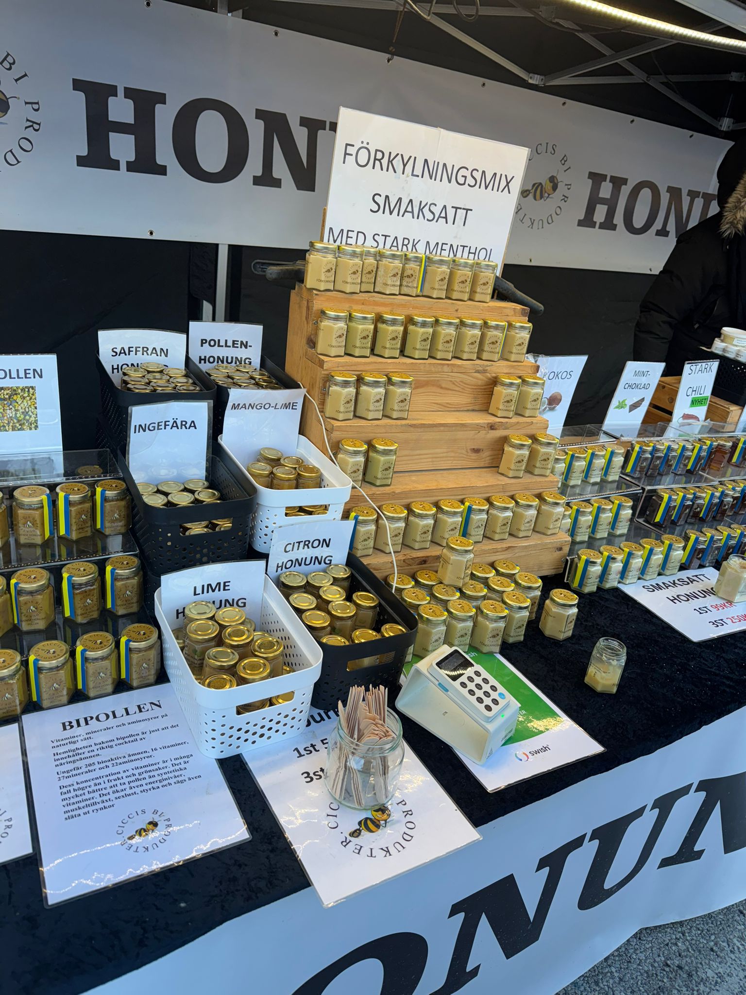snow covered trees and road during daytime