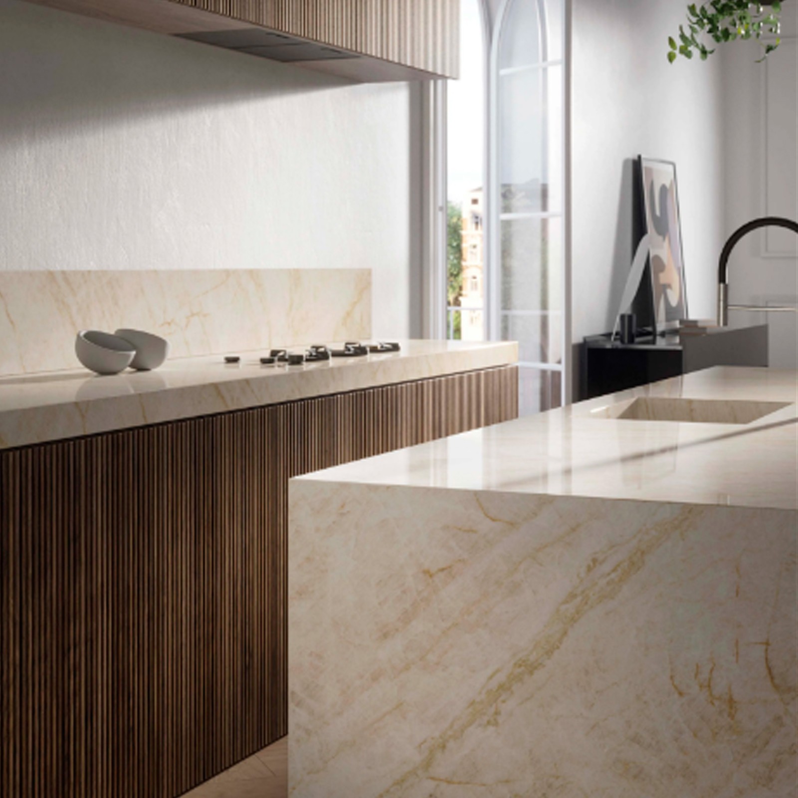 A modern house with large windows and a flat roof, surrounded by greenery against a clear blue sky.