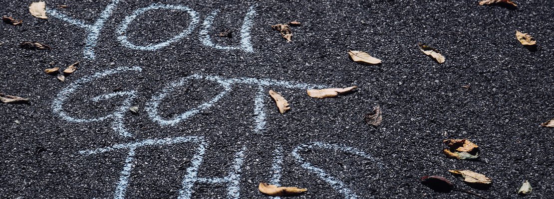 "you got this" writing on the road