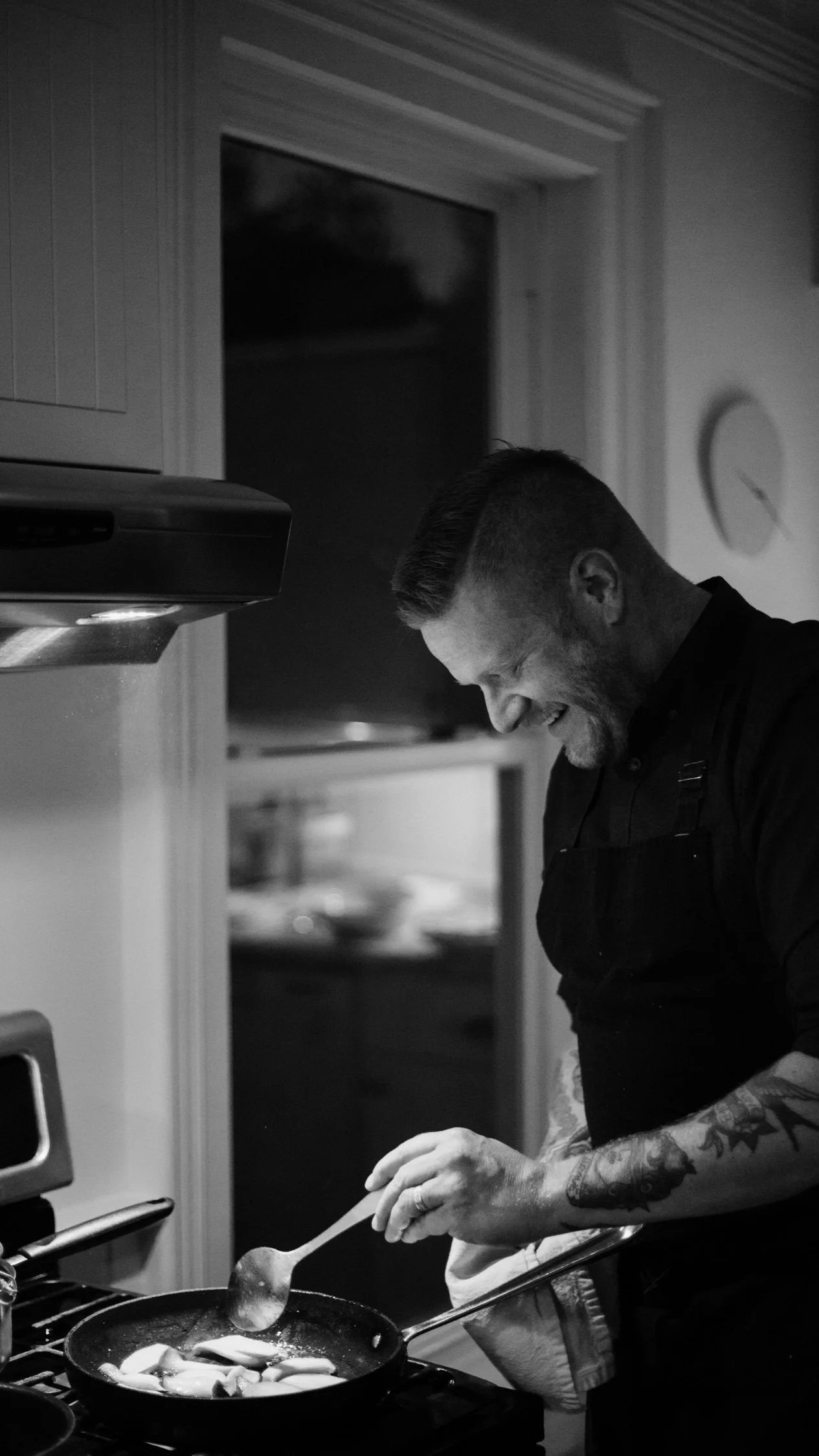 Matt DeMille Chef, smiles cooking a home meal