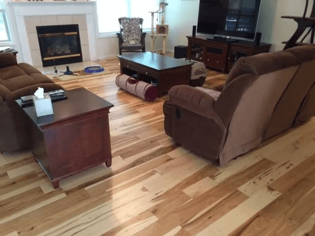 Flooring installation in a cozy living room by Shilling's Carpets & Floors