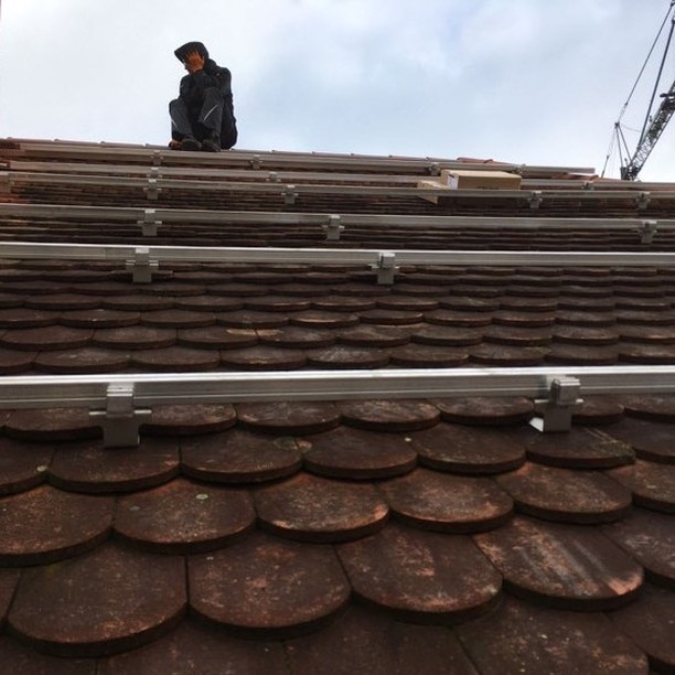 A laptop, tablet and mobile on a table