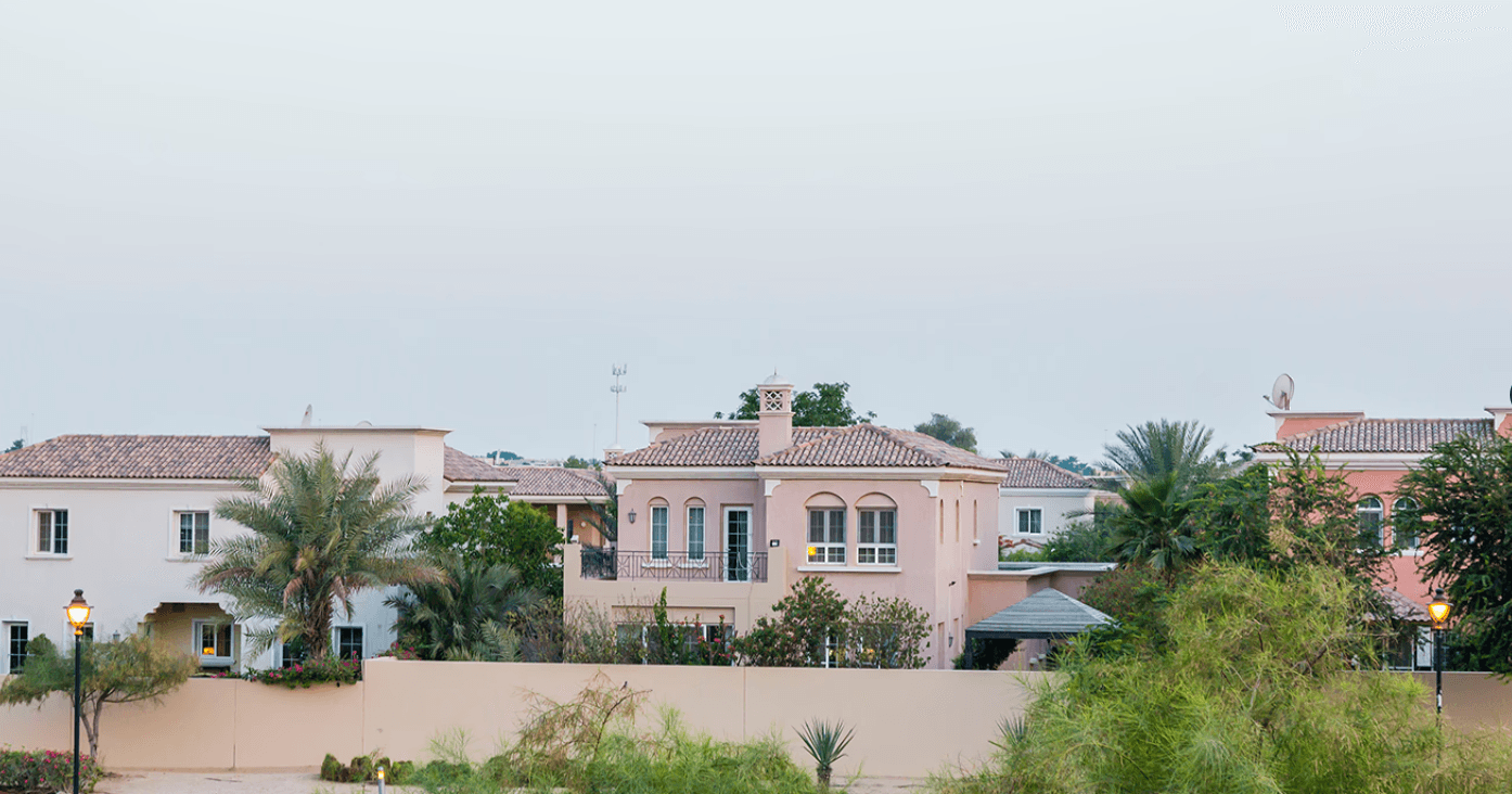 Overhead perspective of Arabian Ranches in Dubai, highlighting the layout of houses and landscaped areas.