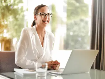 Business professional managing invoice approvals using automated workflow software.