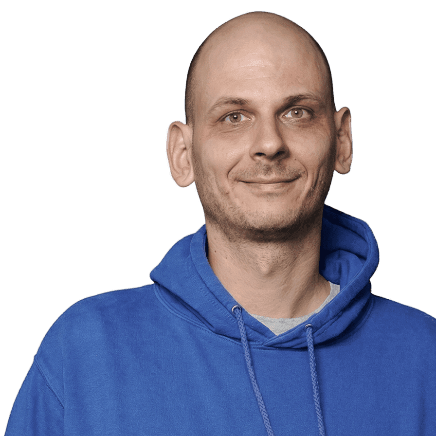 Bald man in blue hoodie smiling