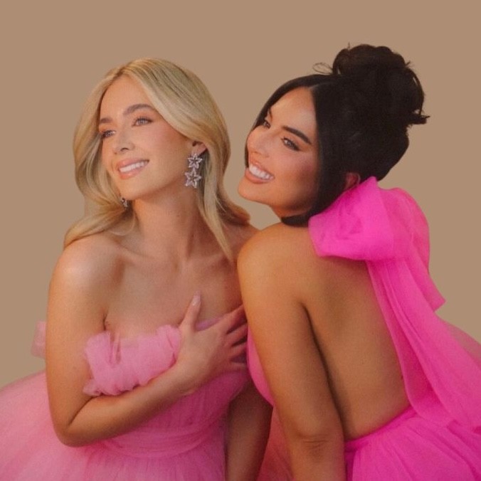 a black and white photo of two women