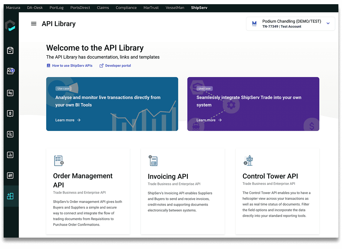 A crew member in an orange suit approaches a large cargo ship while others climb the side of the vessel.