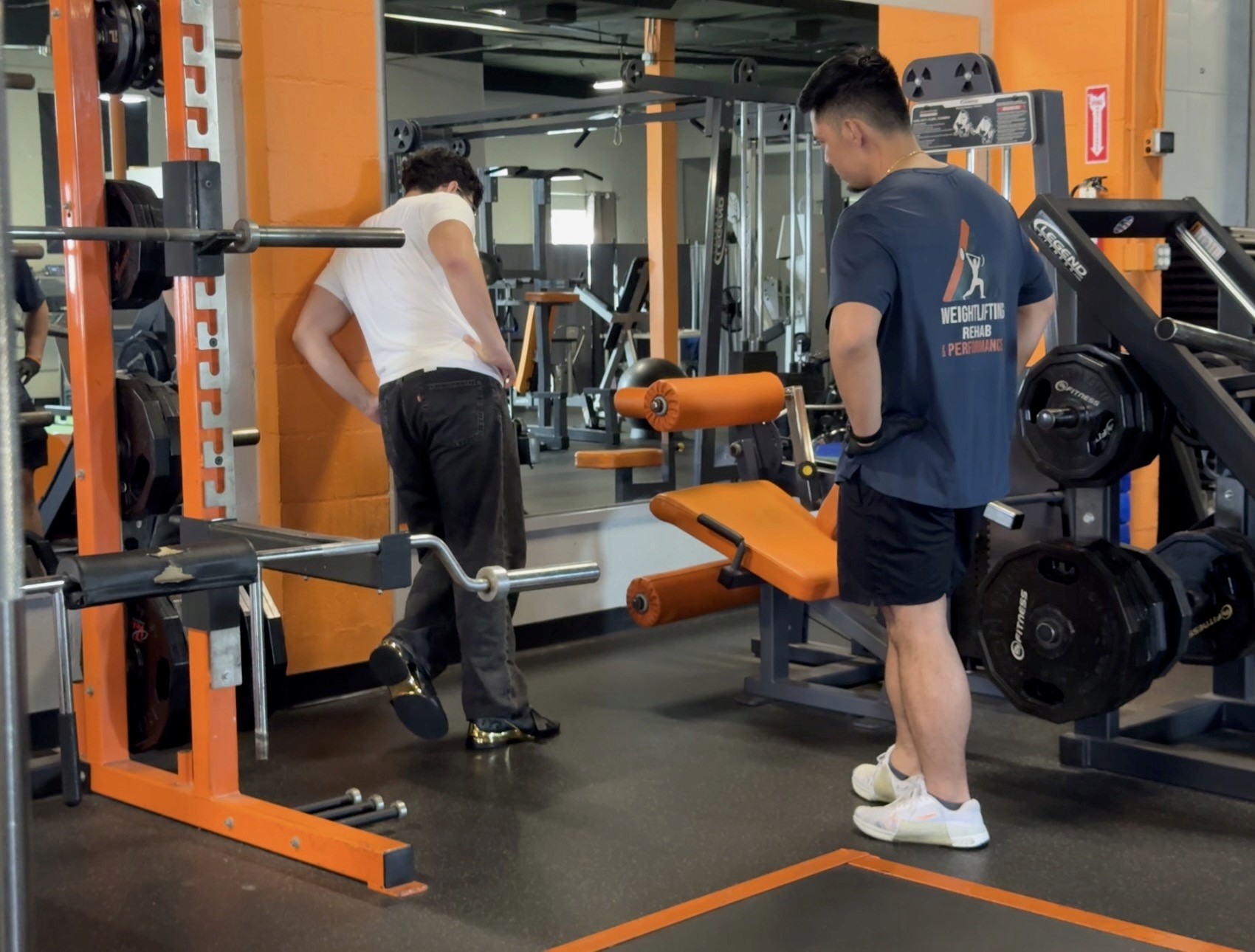 Coach guiding an athlete through a performance assessment