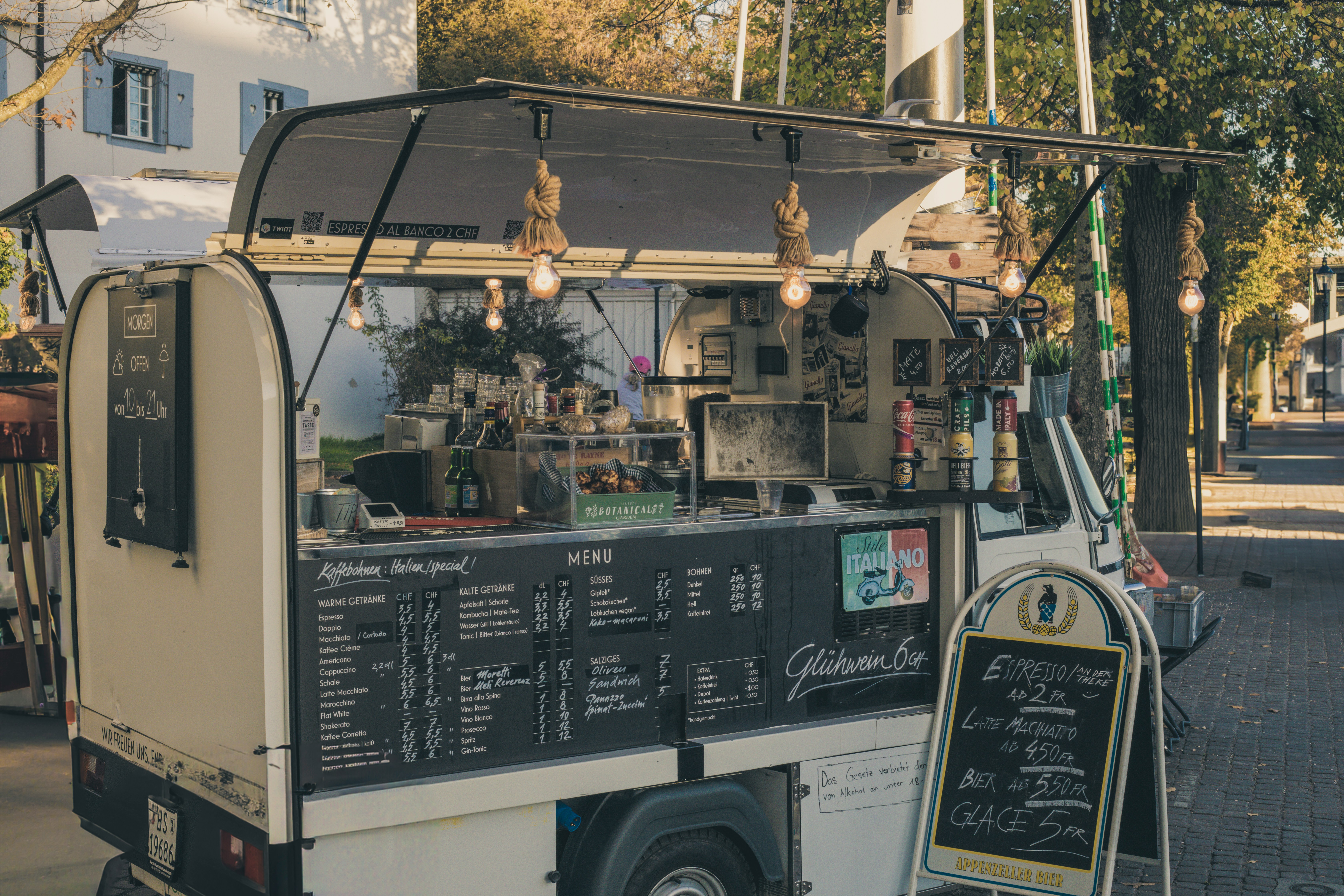 A food truck parked on the side of the road