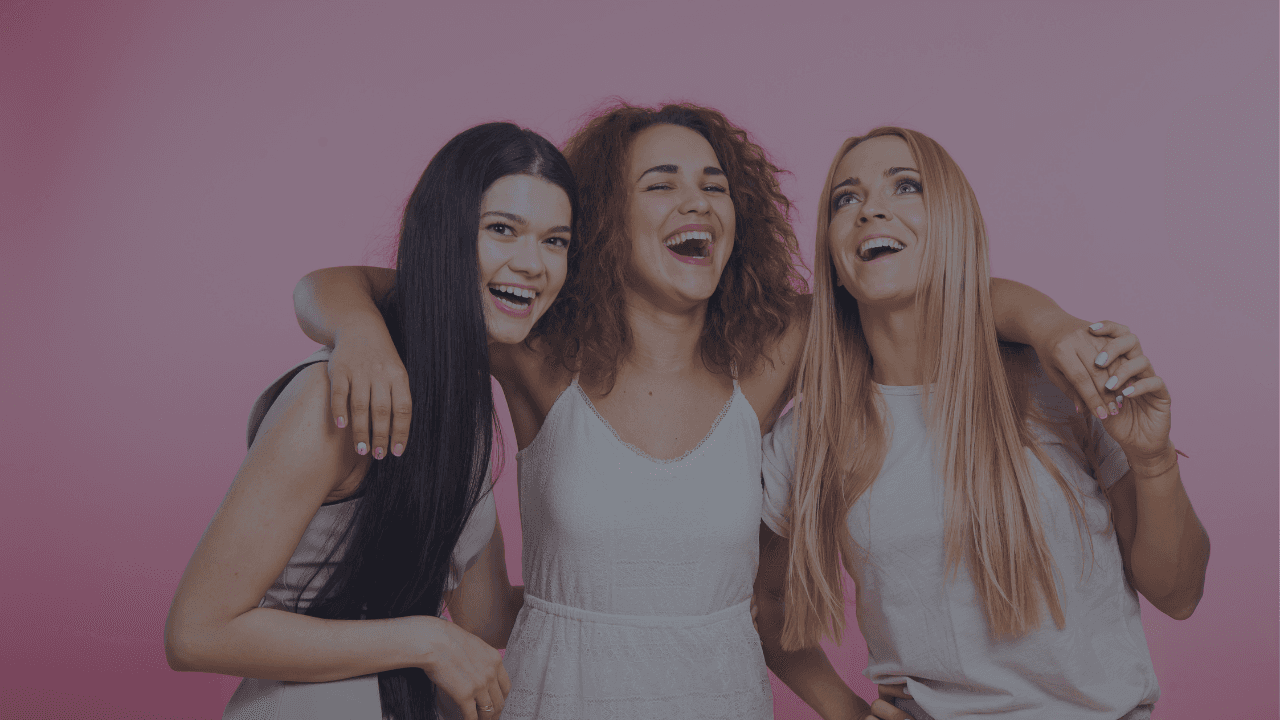 happy girls hugging each other