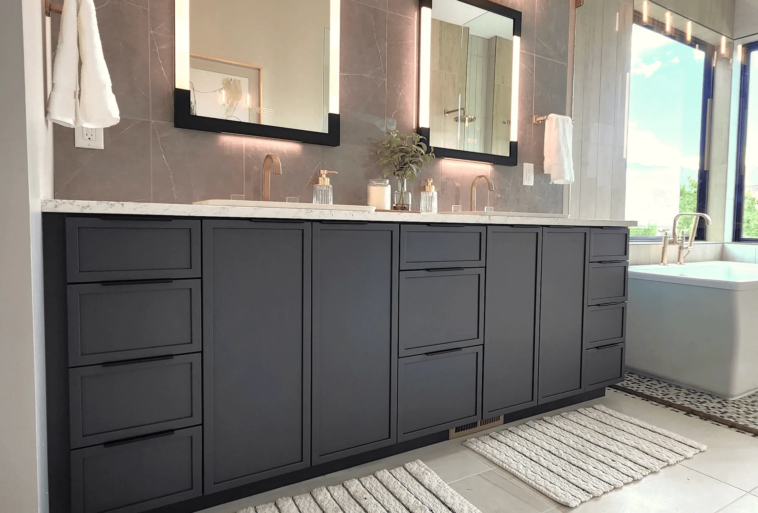 A sculptural vase sits in a built-in niche.