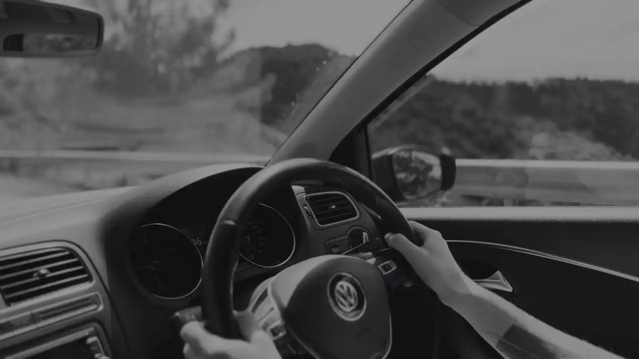gray mercedes benz coupe on black asphalt road during daytime