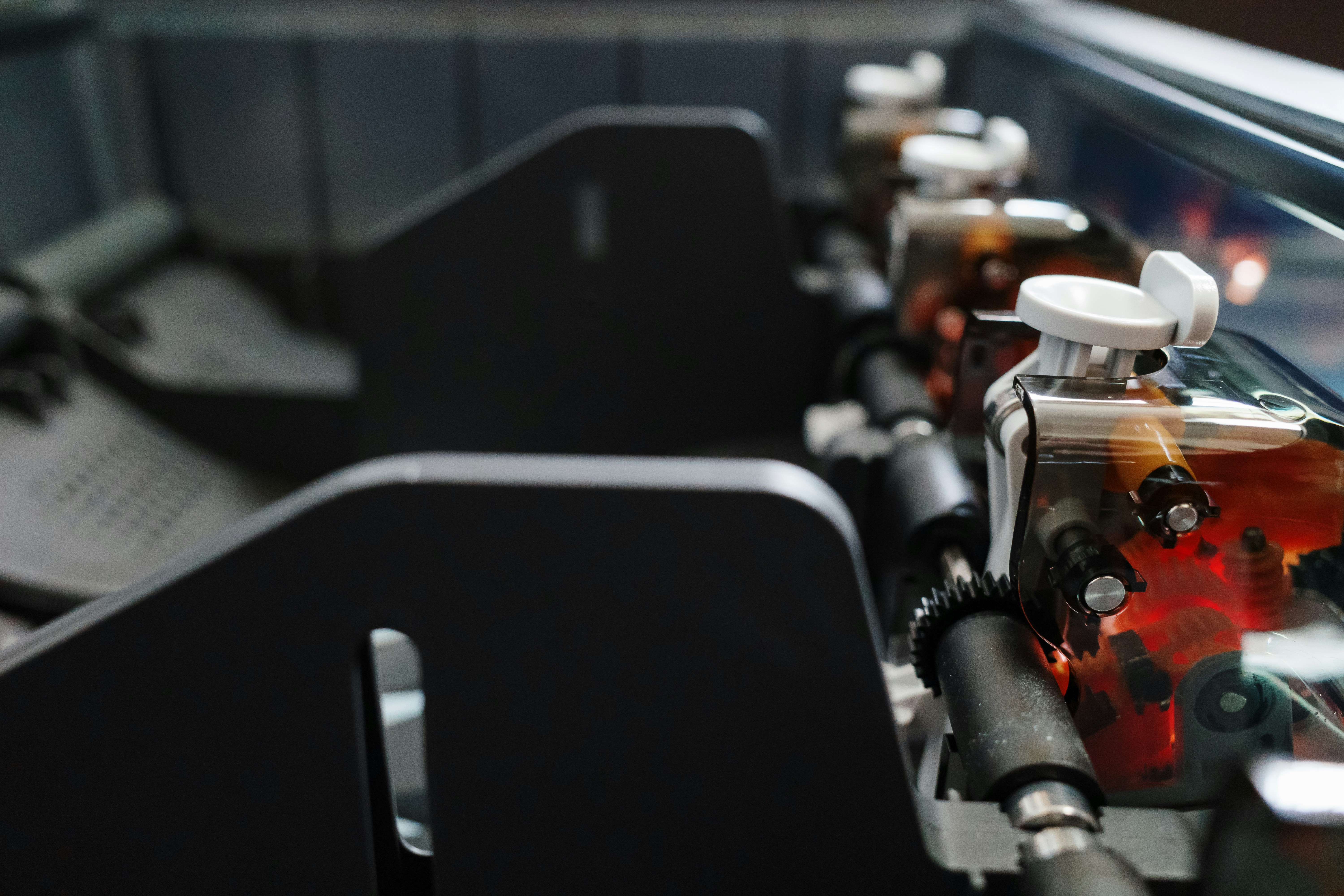 Detailed view of multi-material 3D printing system with filament switching mechanism