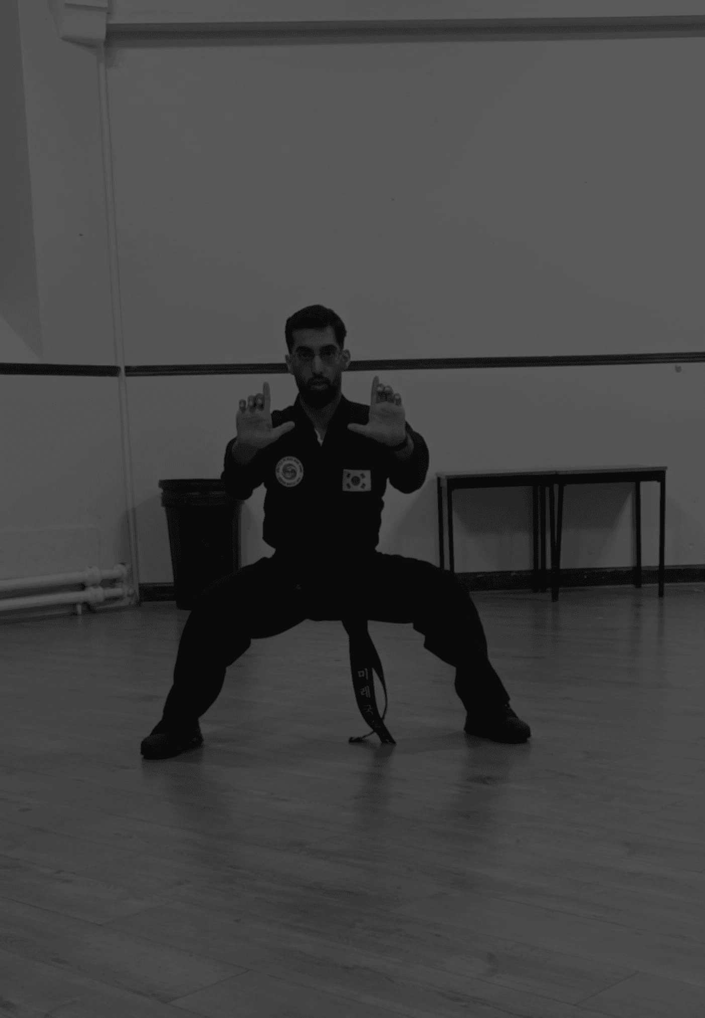 Head instructor Shaz holding a martial arts stance