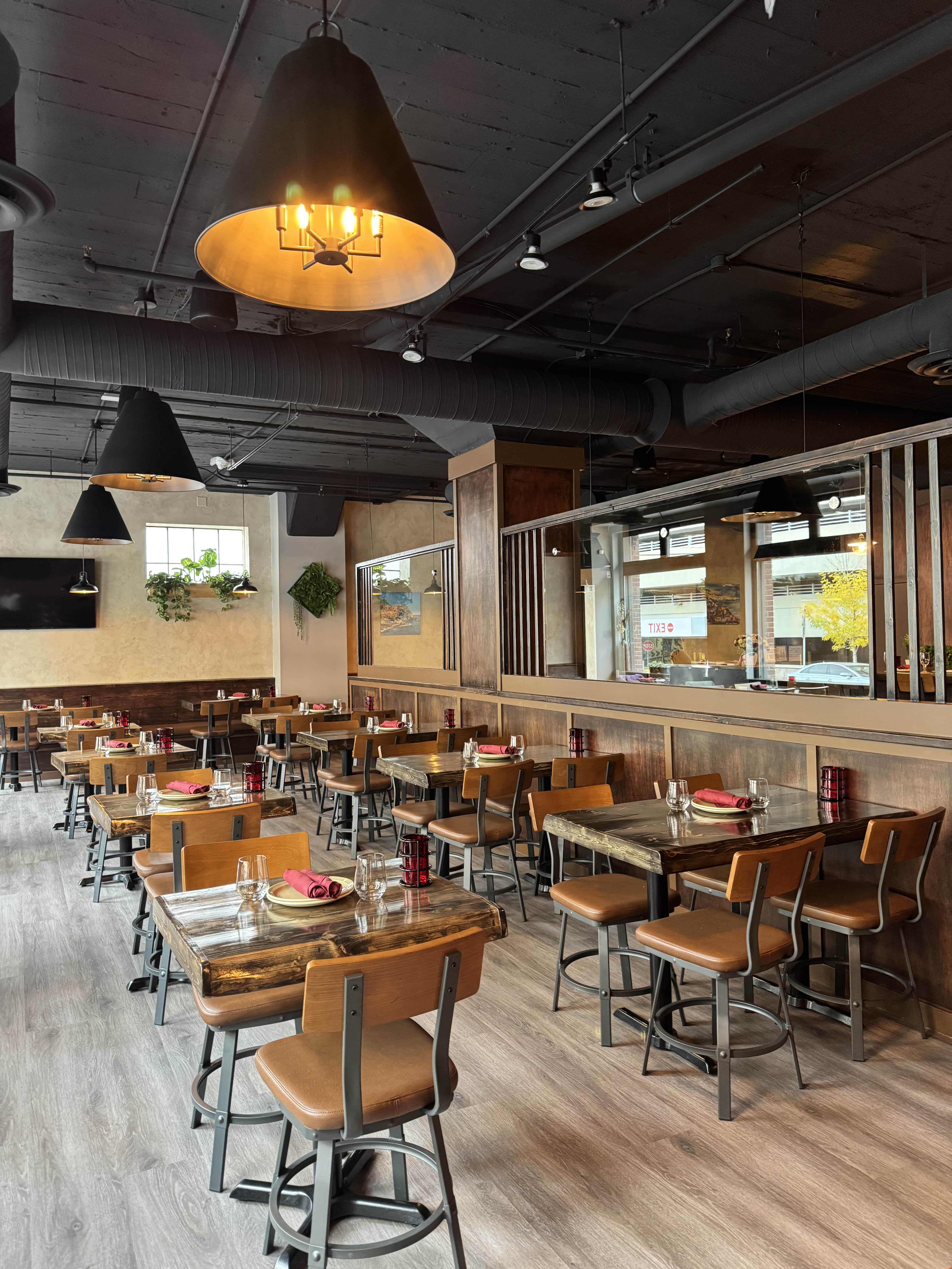 Dining area at Toscana Italian Grill Calgary – Italian restaurant with modern seating and private dining space