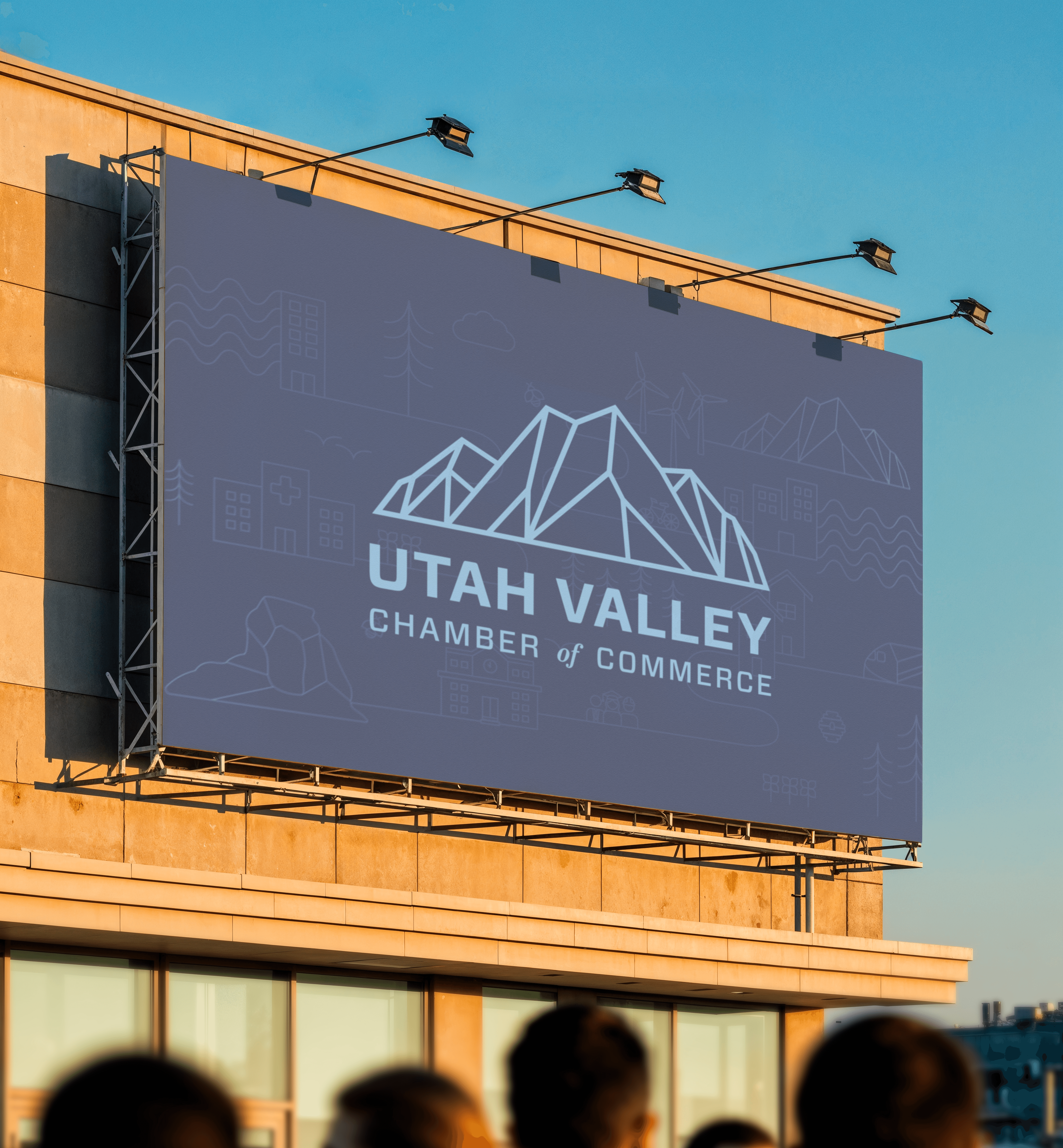 Utah Valley Chamber of Commerce billboard with mountain logo.