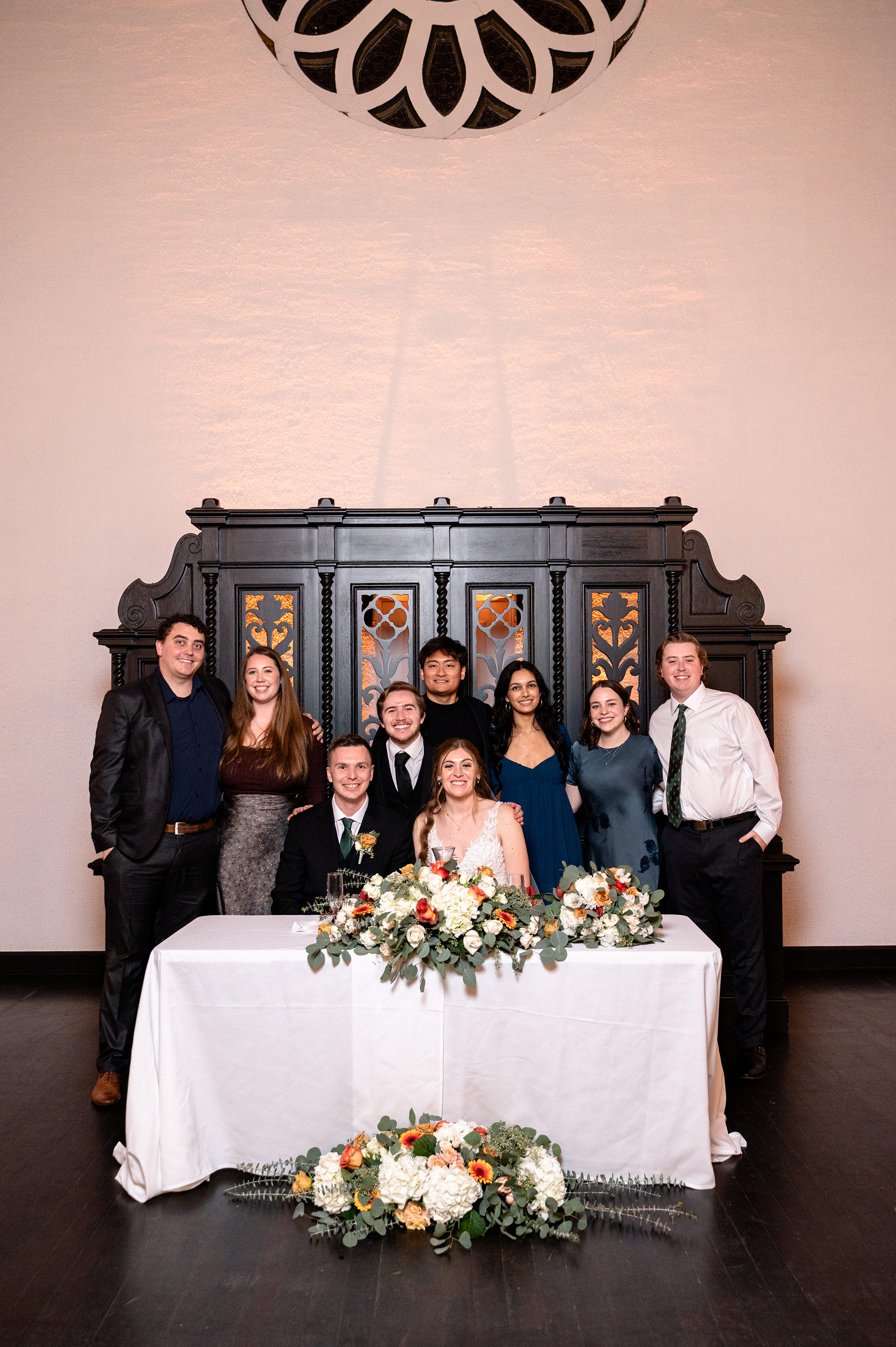 Flat lay wedding details with bouquet, rings, and sparkling bridal heels